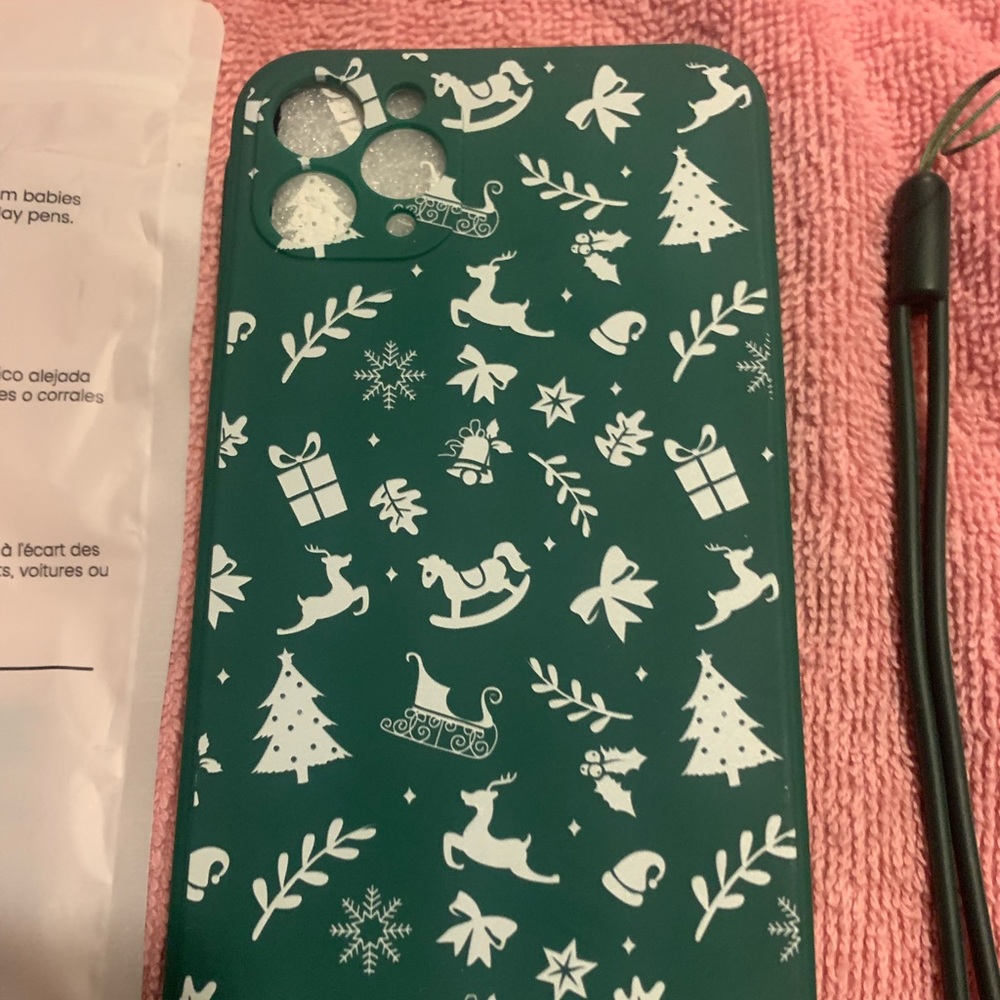IPhone 11 max with case and hand tag